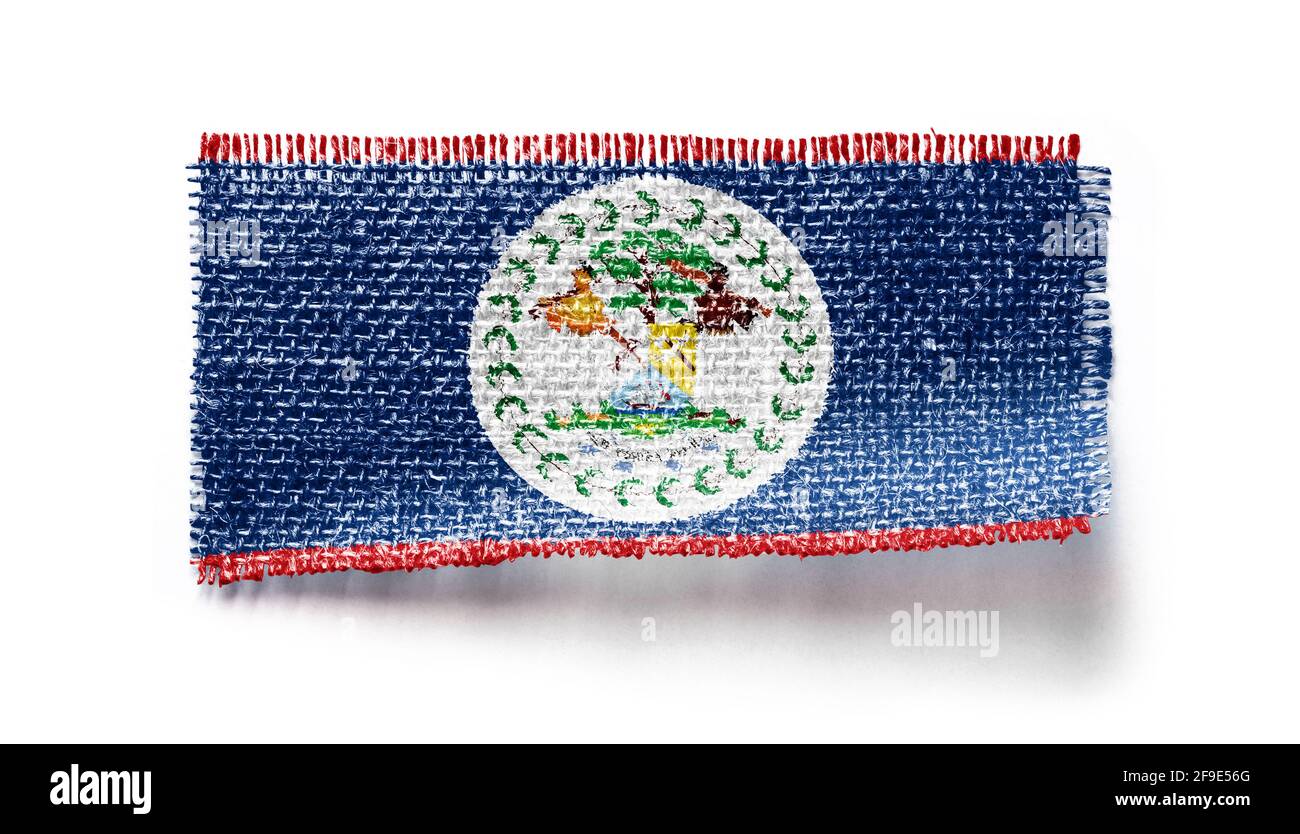 Belize Flagge auf einem Stück Stoff auf einem weißen Hintergrund Stockfoto