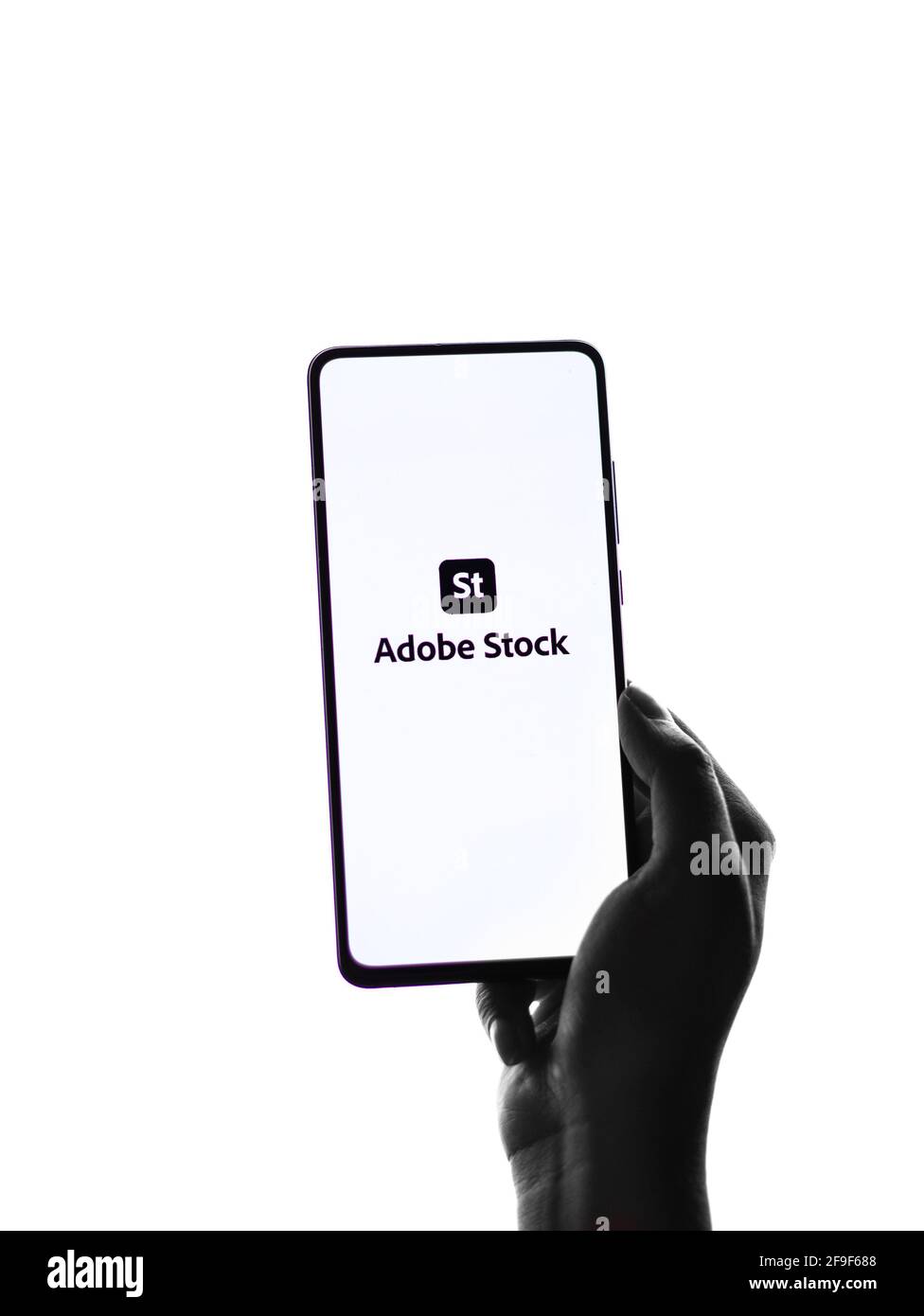 Assam, indien - 19. April 2021 : Adobe Stock-Logo auf dem Handy-Bildschirm Stock Bild. Stockfoto