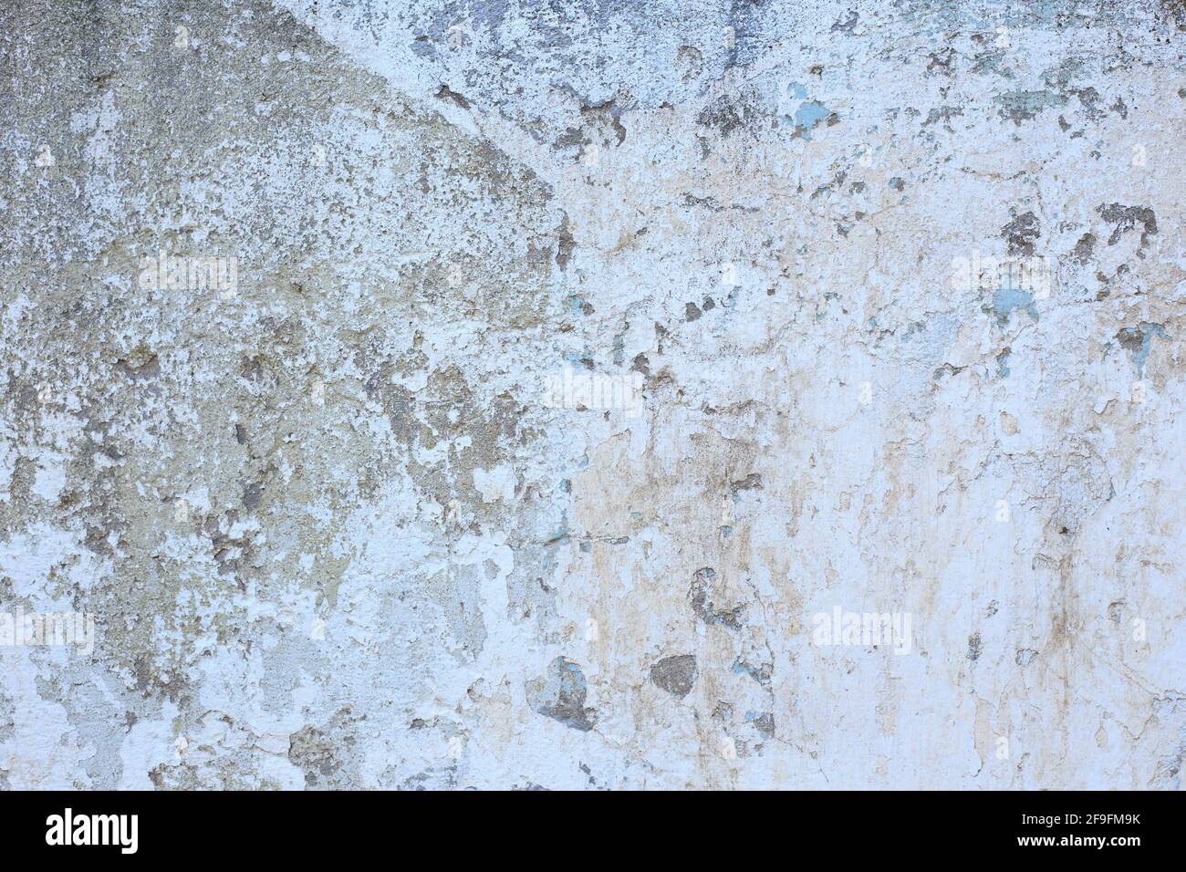 Die Textur der alten Wand. Abstrakter Hintergrund. Weiße, alte Farbe Stockfoto
