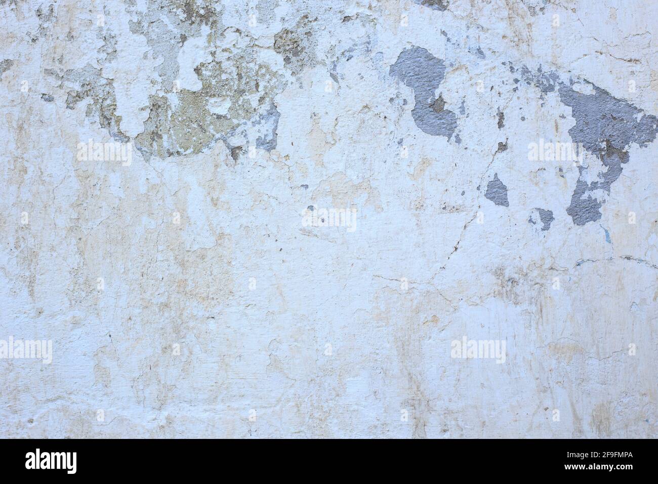 Die Textur der alten Wand. Abstrakter Hintergrund. Weiße, alte Farbe Stockfoto