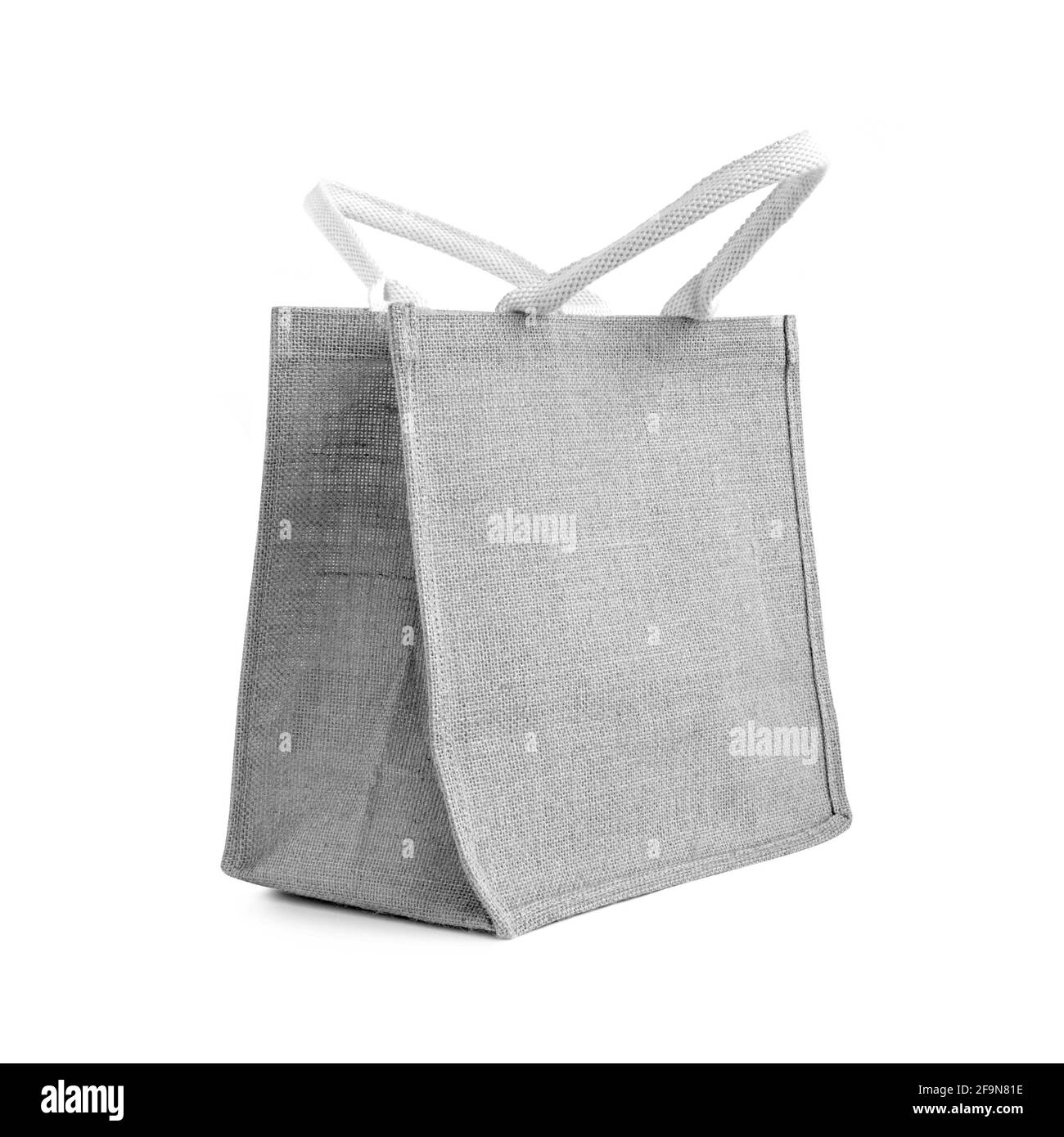 Hessischer oder Jute Bag - wiederverwendbarer grauer Einkaufstasche mit Schlaufengriffe - isoliert Stockfoto