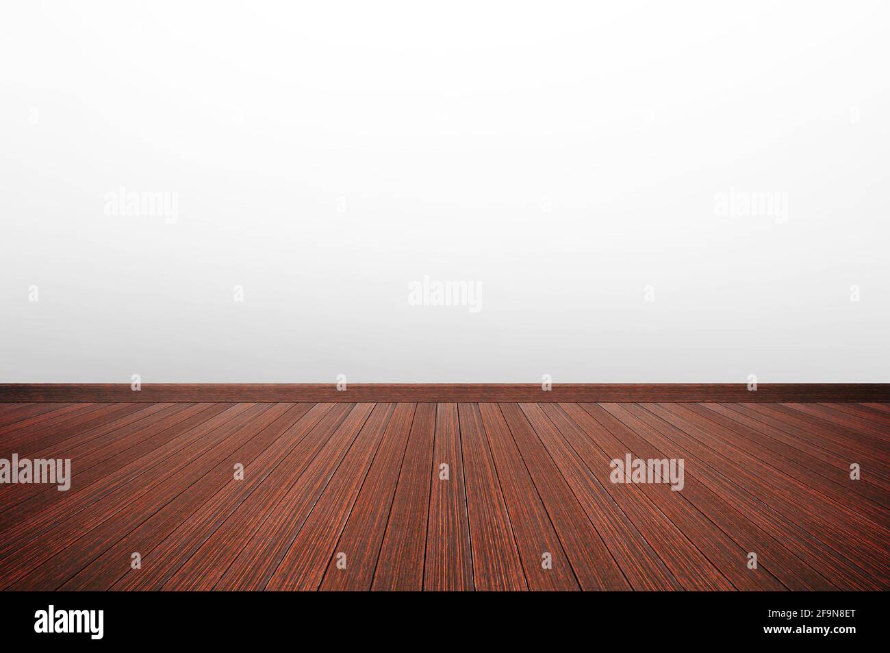 Holzboden & weißgraue Wand als leerer Zimmerhintergrund Stockfoto