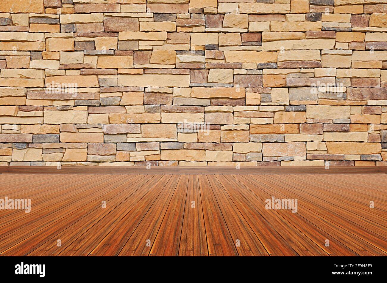 Holzboden & Steinwand als leerer Raum Hintergrund Stockfoto