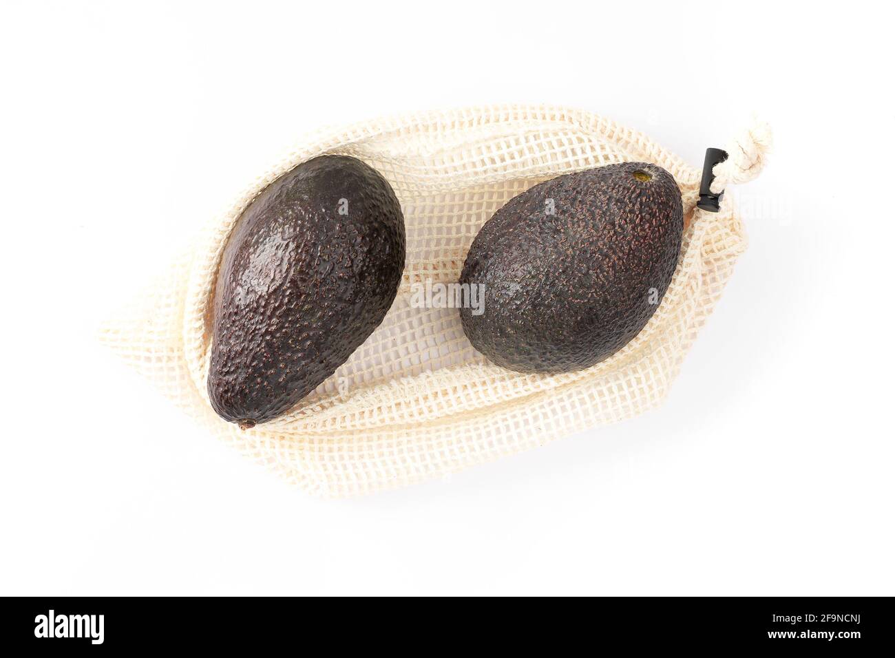 Umweltfreundliche natürliche Textiltasche mit Avocado. Stockfoto