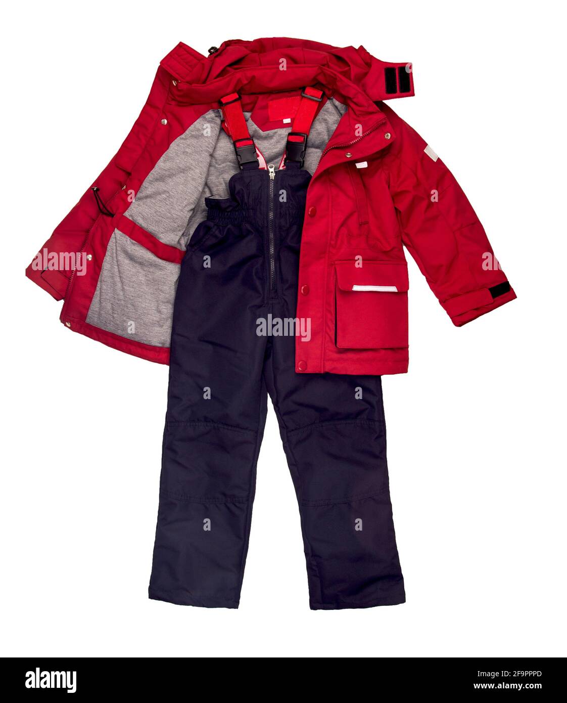 Isoliertes Set aus Jacken und Hosen für Kinder bei kaltem, nassem Wetter. Stockfoto