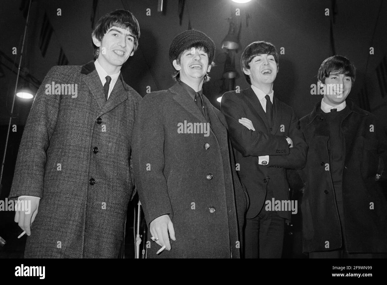 Die Beatles im Washington Coliseum am 11. Februar 1964, für ihr erstes Konzert in Amerika, zwei Tage nach ihrem Auftritt auf der Ed Sullivan Show. Im Bild L bis R sind: George Harrison, Ringo Starr, Paul McCartney und John Lennon. (USA) Stockfoto