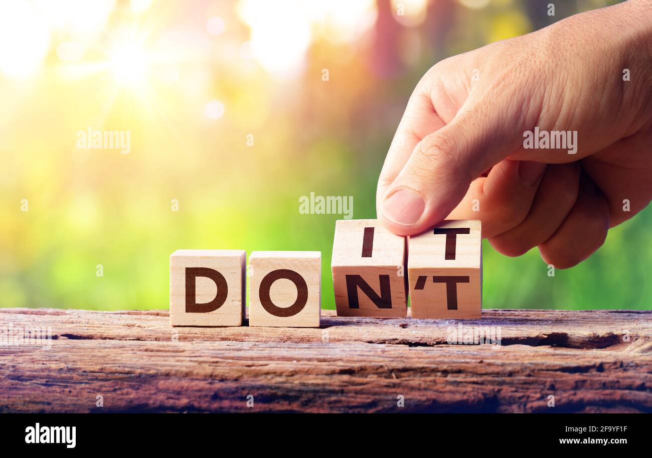 Hand Flip Holzblock - Wort nicht ändern zu tun It Stockfoto