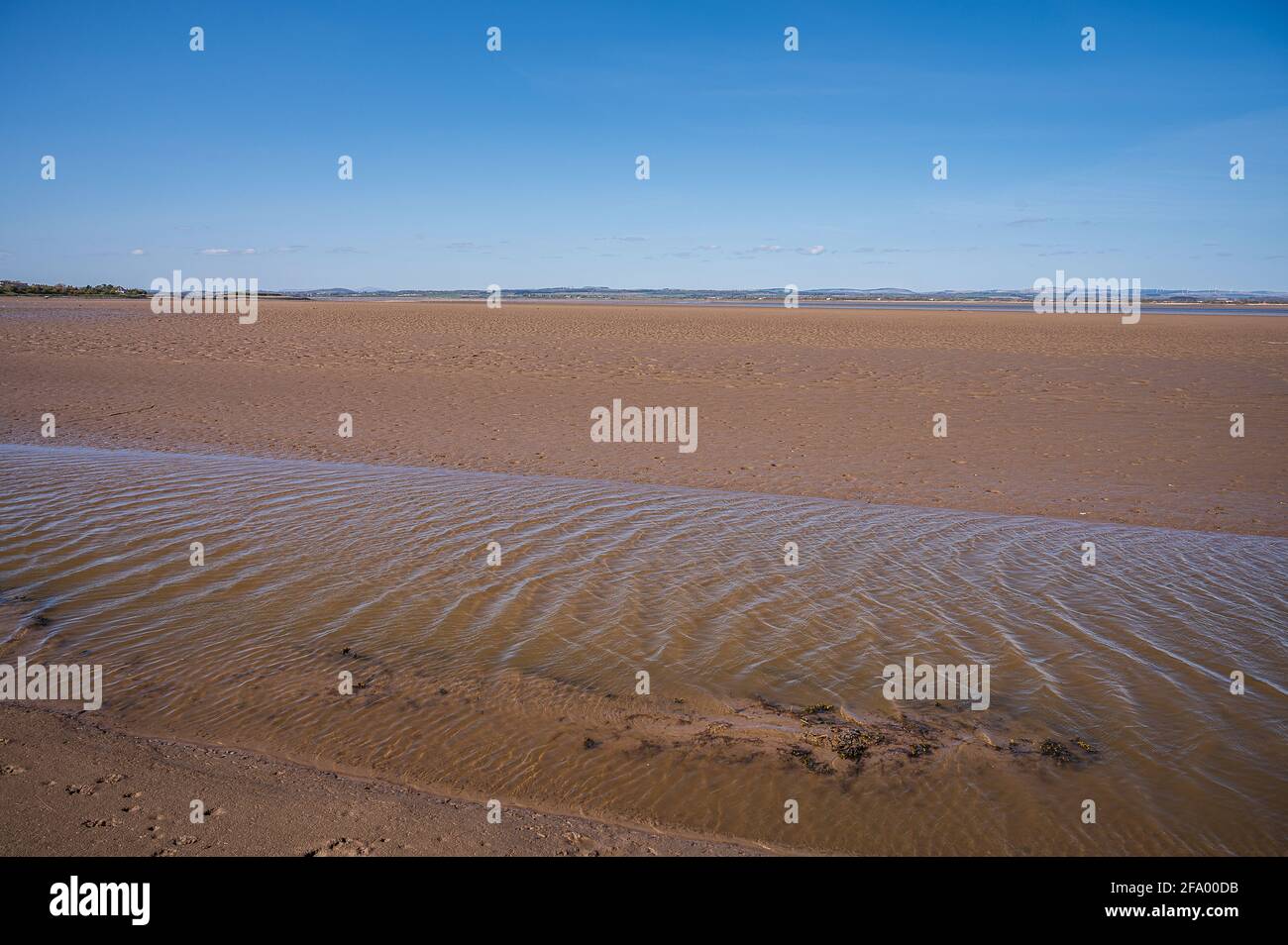 Sandstrand bei Ebbe, Port Carlisle, Cumbria, England Stockfoto