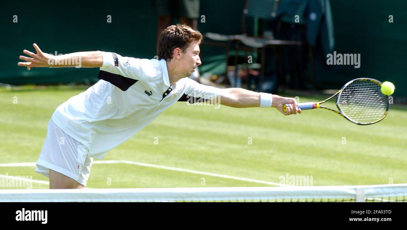WIMBLEDON TENNIS CHAMPIONSHIPS 1. TAG ALEX BOGANOVIC WÄHREND SEINES SPIELS MIT K.KIM 20/6/2005 BILD DAVID ASHDOWNWIMBLEDON TENNIS Stockfoto