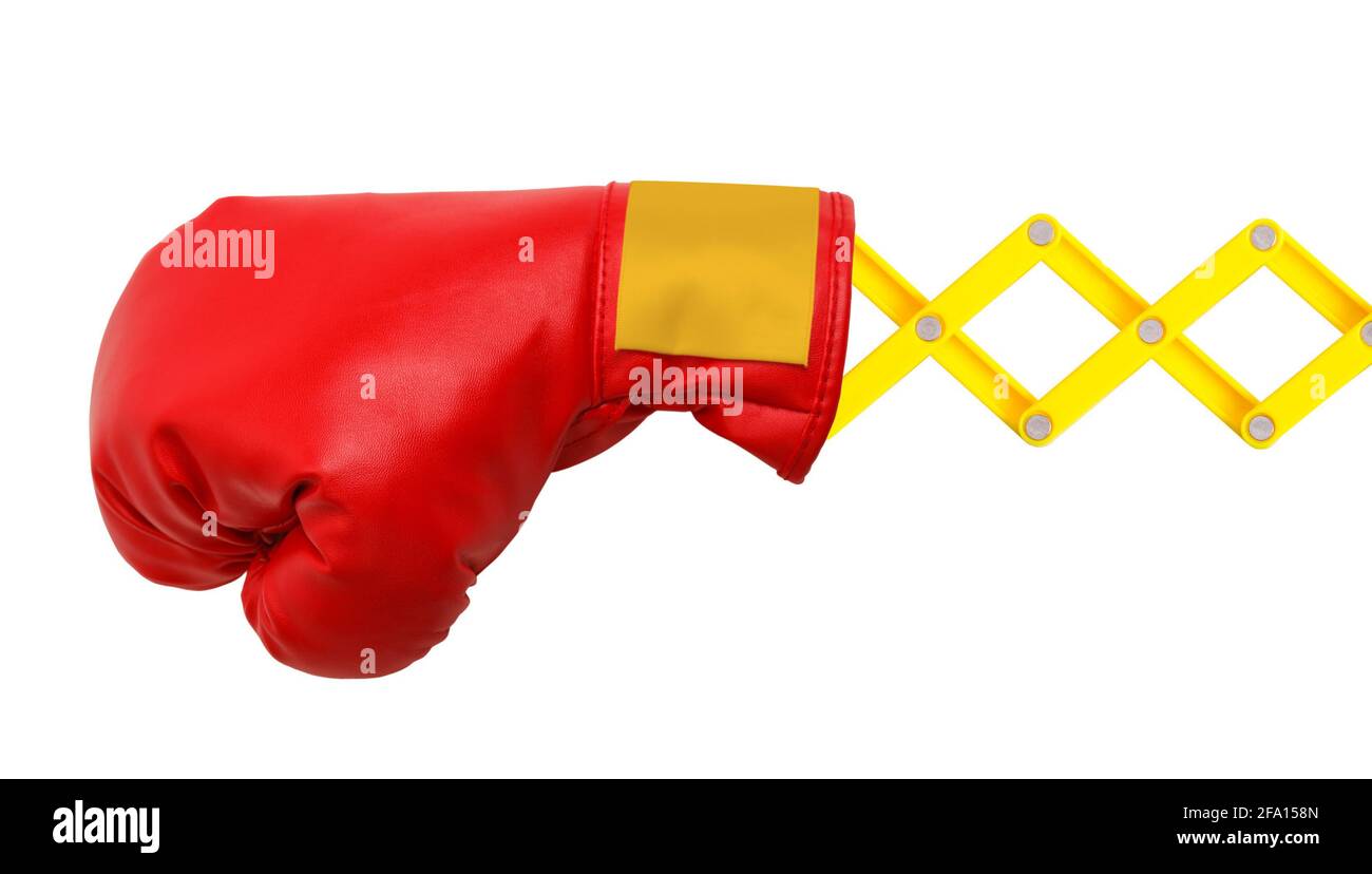 Roter Boxhandschuh am ausgeschnittenen Concertina-Arm. Stockfoto