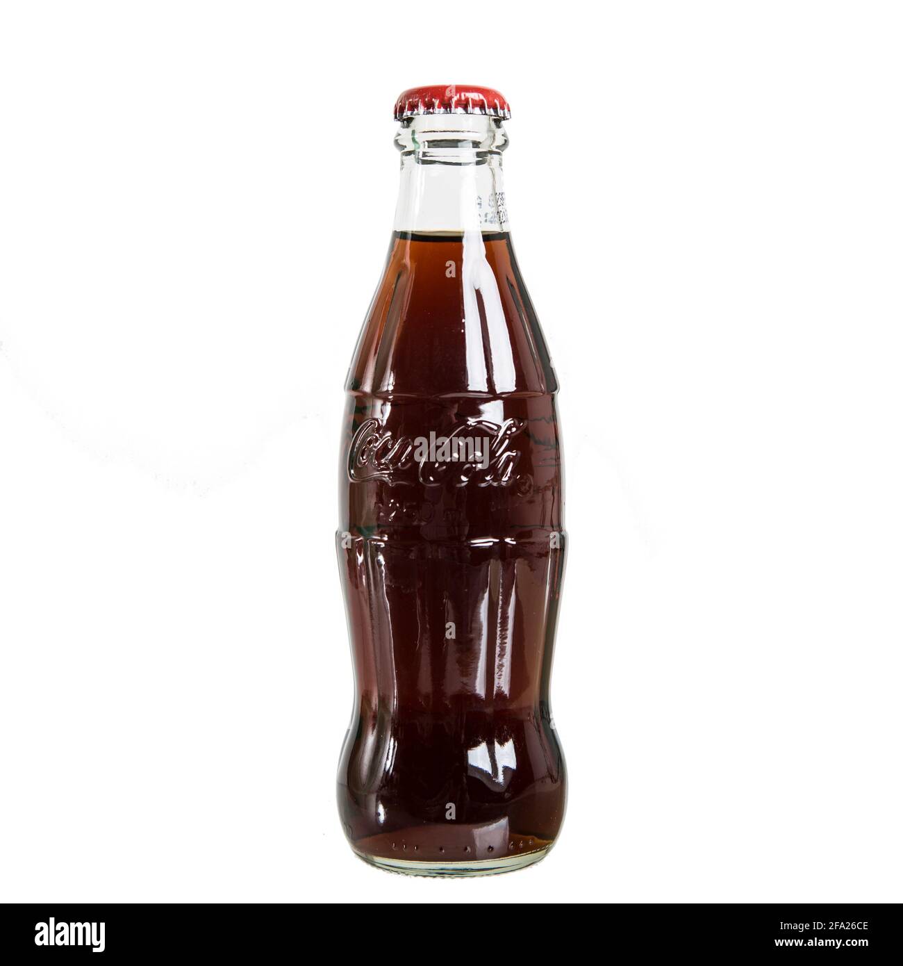 Die klassische Coca-Cola Flasche aus Glas mit der seit Jahren weltweit bekannten Form. Stockfoto