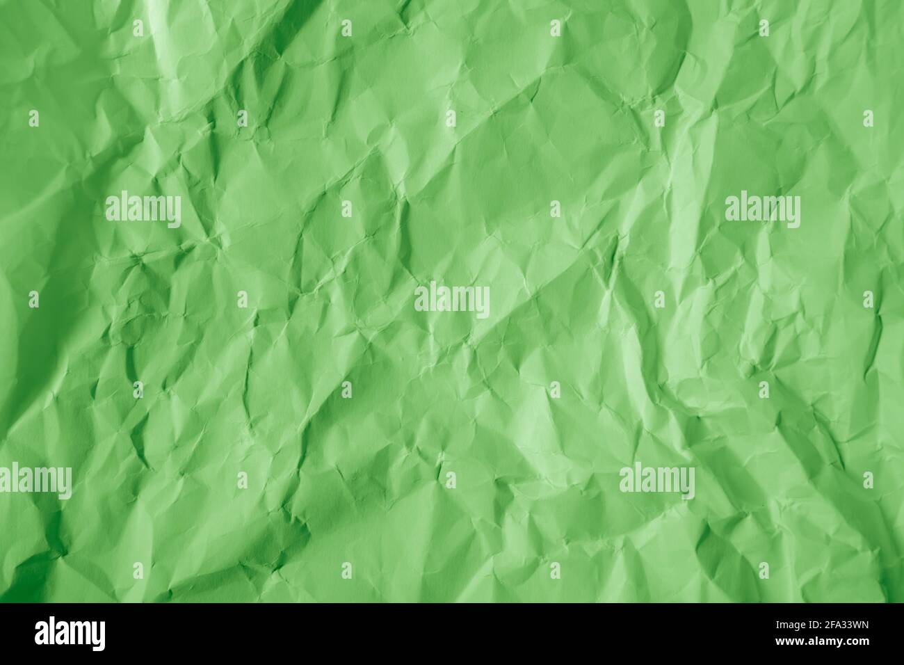 Zerknitterter grüner Papiertextur-Hintergrund Stockfoto