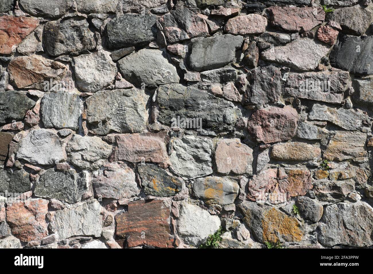Nahaufnahme einer alten Steinmauer. Stockfoto