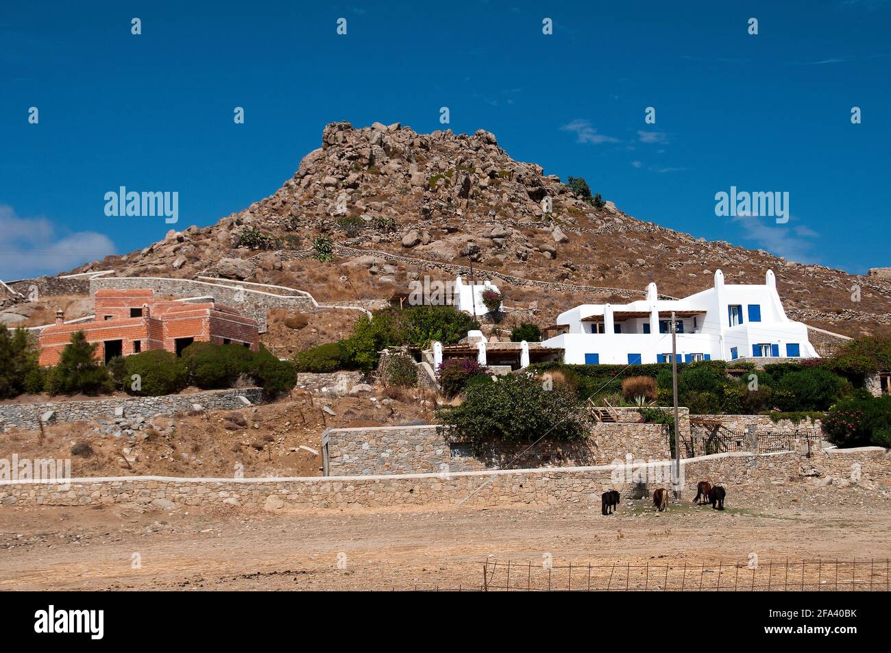 Häuser am Hang, Mykonos, Griechenland Stockfoto