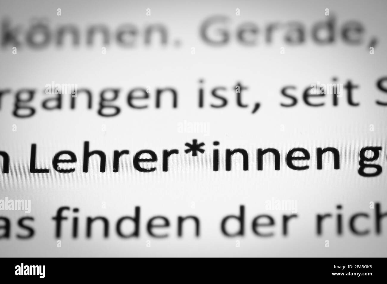 Gender Star in einem deutschen Text, der sowohl männlich als auch Weibliche Lehrerinnen Stockfoto
