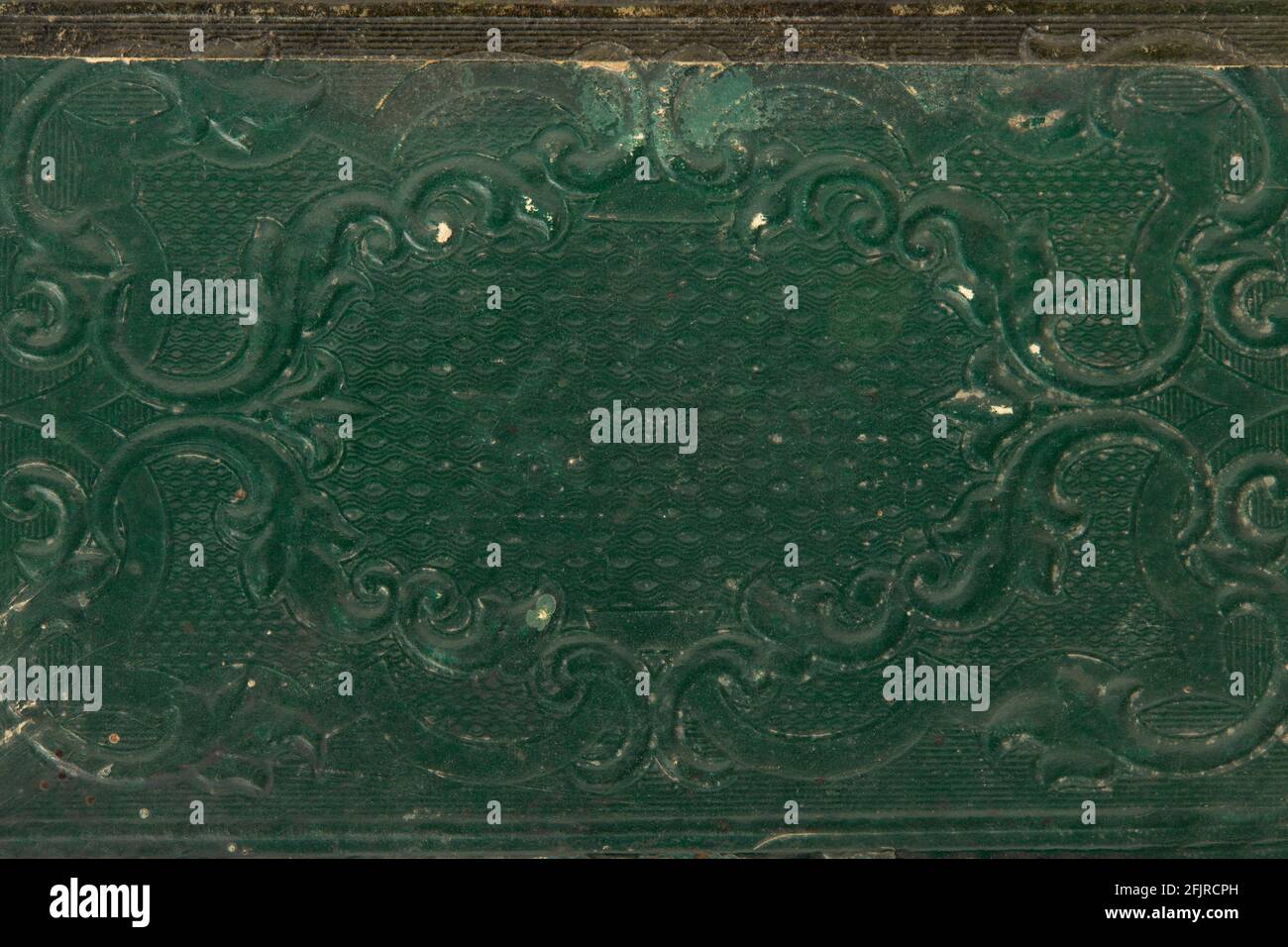Altes, grünes Buchcover mit Dekorations-Texturhintergrund Stockfoto
