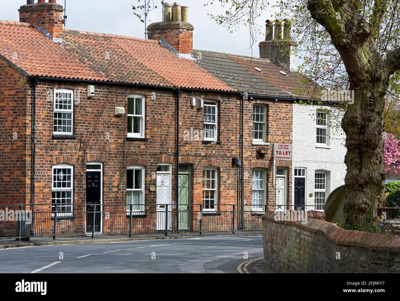 Reihe von gemauerten Reihenhäusern in Cottingham, East Yorkshire, England Stockfoto