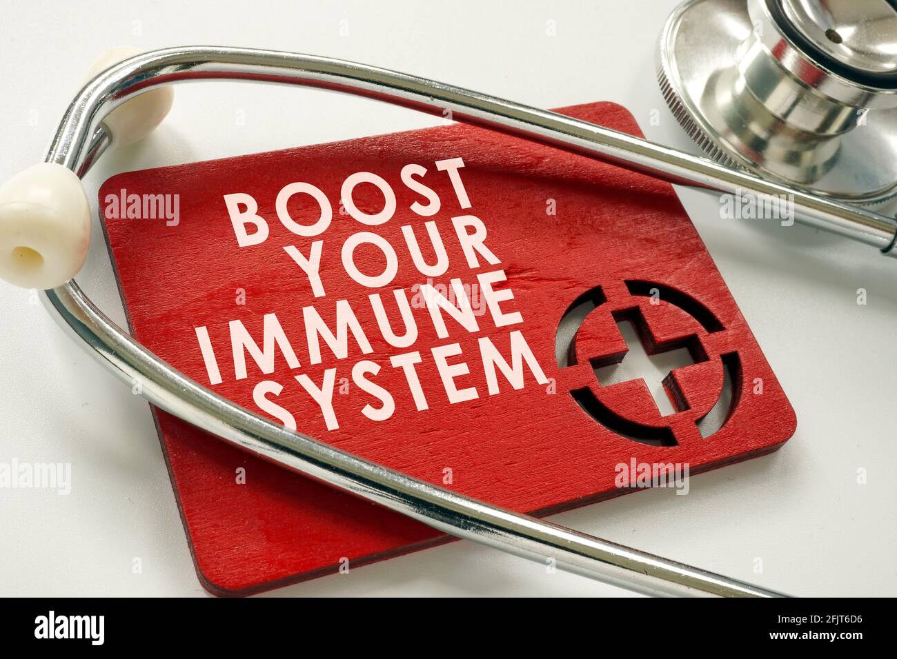 Stärken Sie Ihr Immunsystem Worte und Stethoskop. Stockfoto