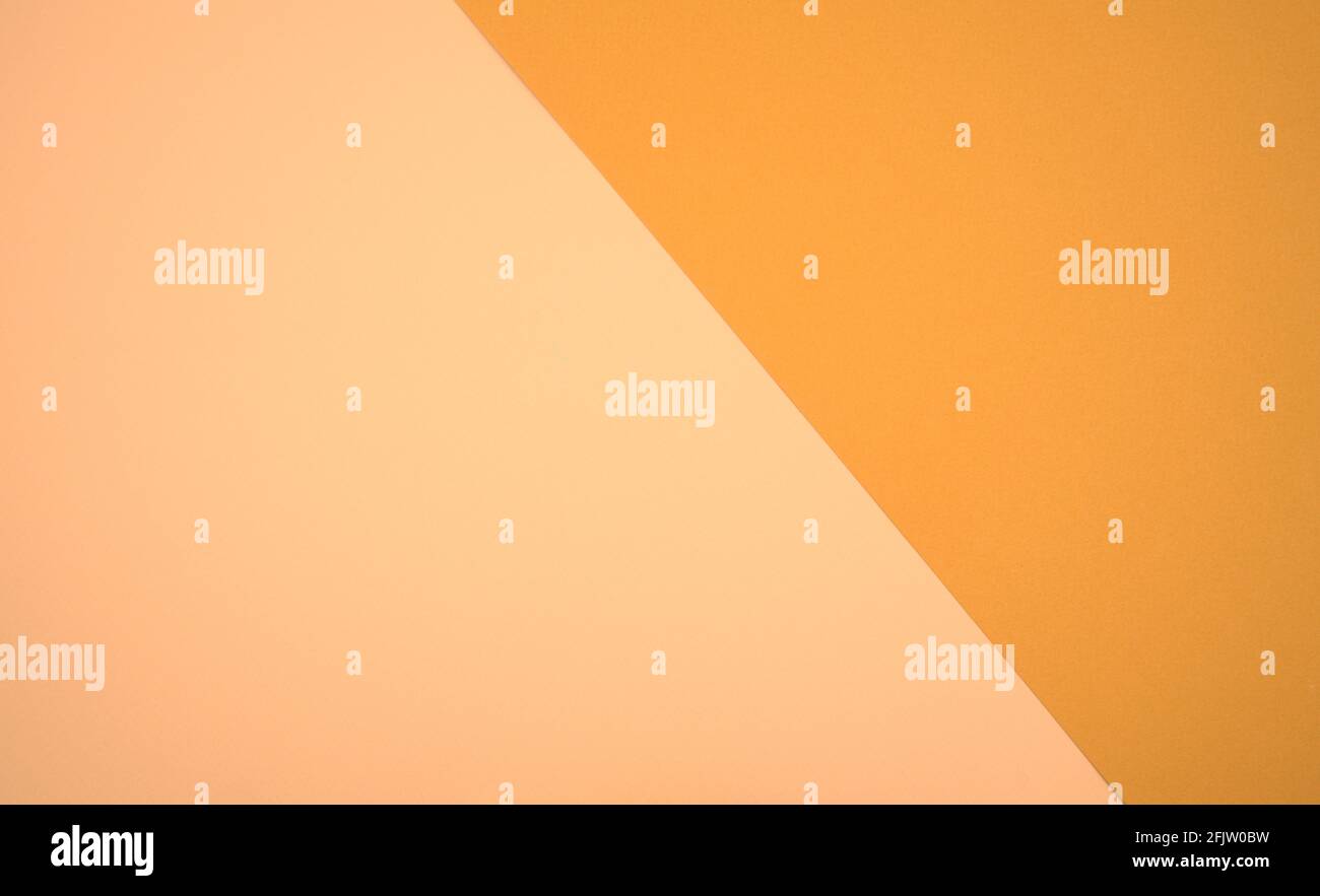 Neutral pastellrosa, gelb gebrannter sienna zweifarbige Farben leeres Papier abstrakter Hintergrund. Stockfoto