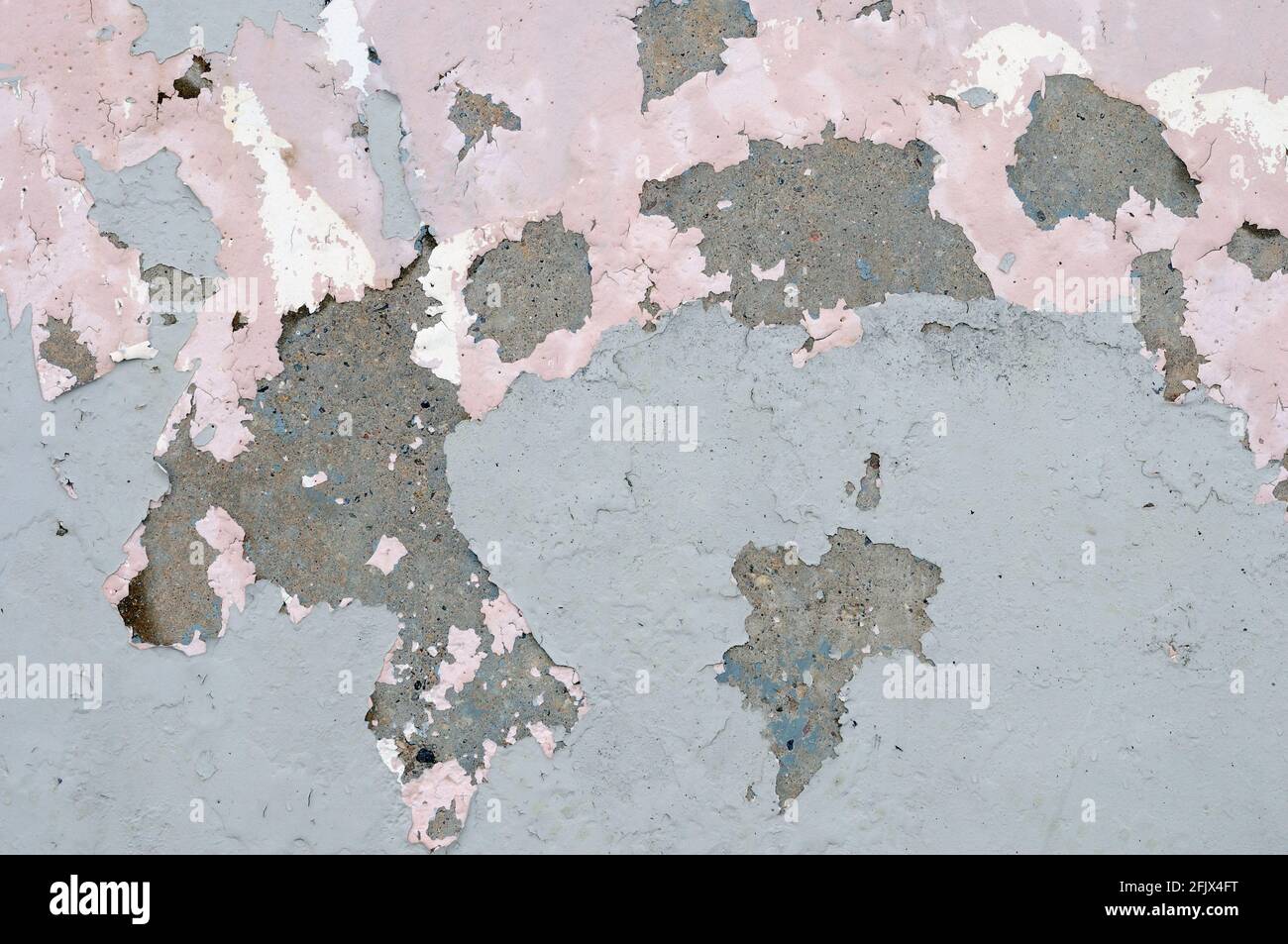 Die Farbe blättert von der Betonwand ab. Geeignet als Hintergrund oder Textur. Stockfoto