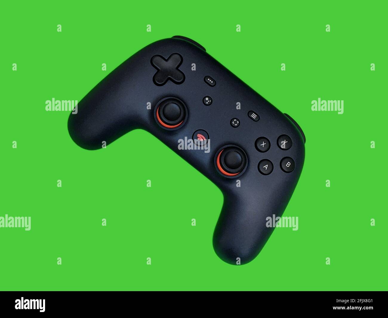 Seattle, WA / USA - ca. November 2019: Nahaufnahme eines Google Stadia Gaming Controllers vor einem farbenfrohen Hintergrund Stockfoto