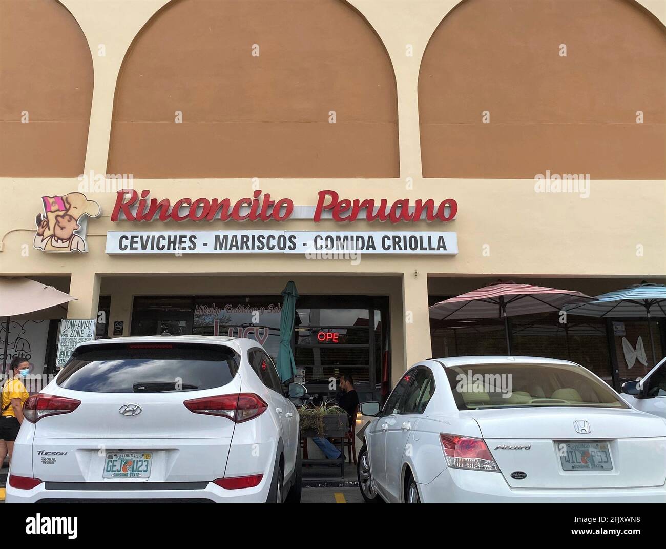 Das familiengeführte Restaurant Rinconcito Peruano ist ein lebendiges, urbanes Restaurant, das moderne Interpretationen traditioneller peruanischer Komfortgerichte serviert. Stockfoto