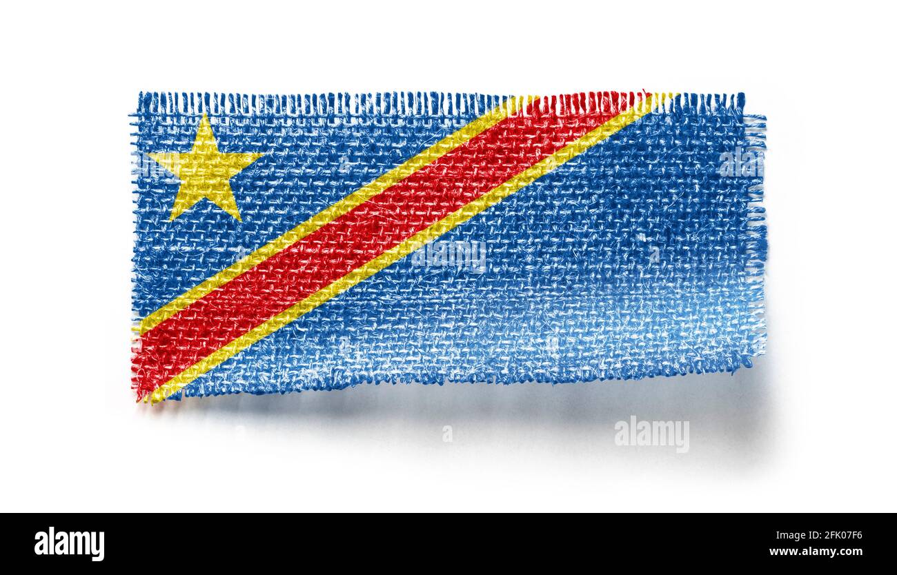 Demokratische Republik Kongo Flagge auf einem Stück Tuch auf weißem Hintergrund Stockfoto