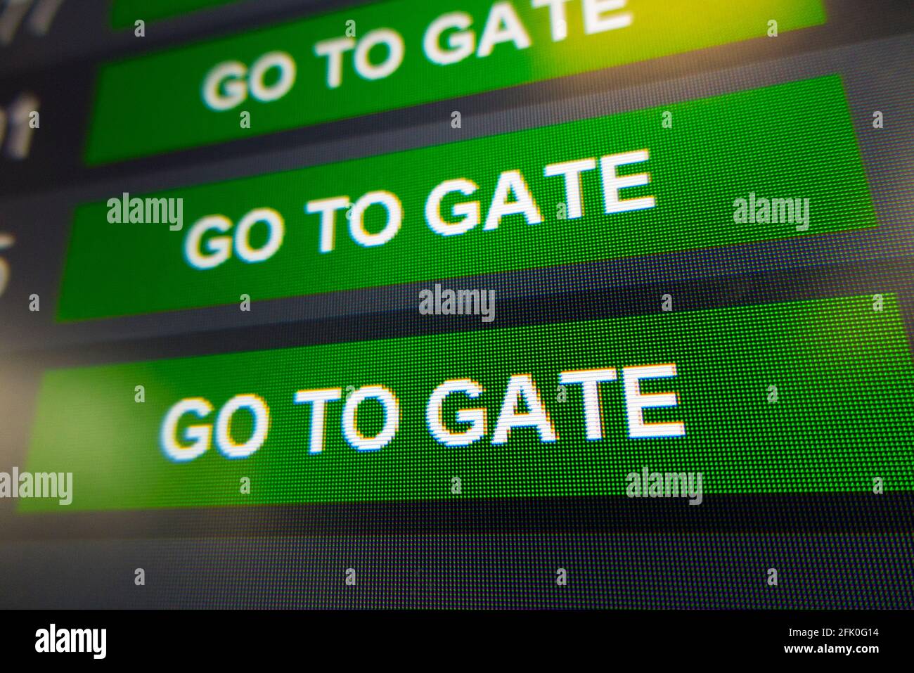 Abfluganzeige-Bildschirm mit der Nachricht zum Abflug Go to Gate, in der  Abflughalle des / am Flughafen Genf / Genf, Cointrin, Schweiz. (101  Stockfotografie - Alamy