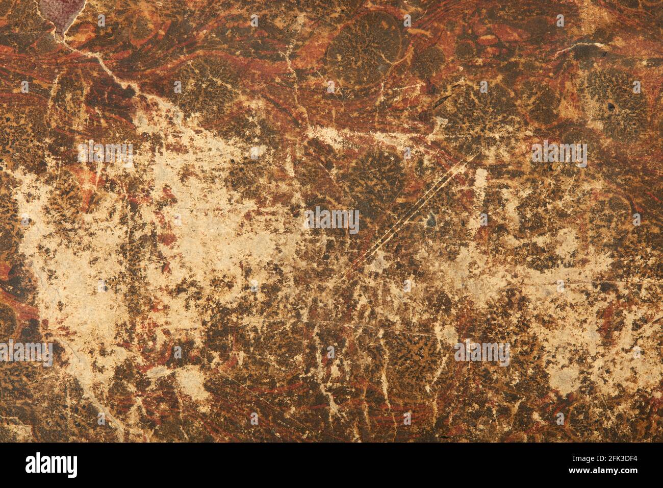 Brauner, alter und vielbunter Papiertextur-Hintergrund mit Kratzern Stockfoto