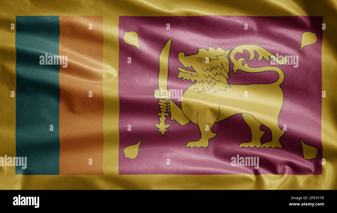 Flagge Sri Lankas winkt im Wind. Nahaufnahme eines Ceylon-Banners, weiche und glatte Seide. Stoff Stoff Textur Fähnrich Hintergrund. Verwenden Sie es für nationa Stockfoto