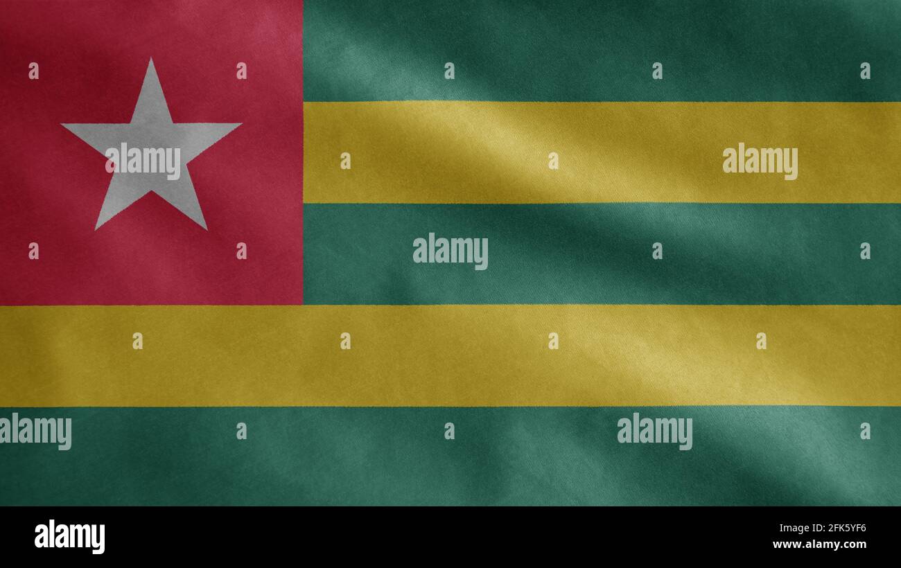 Togolesische Flagge winkt im Wind. Nahaufnahme des Togo-Banners, weiche und glatte Seide. Stoff Stoff Textur Fähnrich Hintergrund. Stockfoto