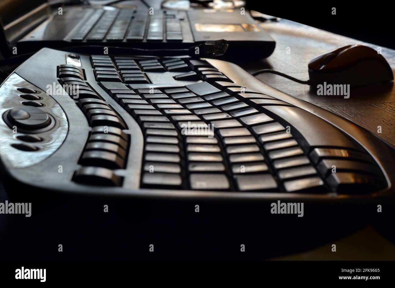 Hinterleuchtete Details von Computertastaturen. Stockfoto