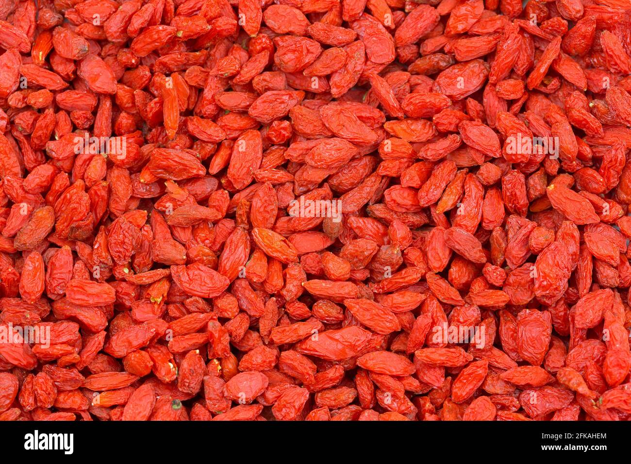 Nahaufnahme Textur der getrockneten roten Goji-Beere, Wolfberry-Frucht (Lycium barbarum) in der traditionellen chinesischen Medizin verwendet Stockfoto