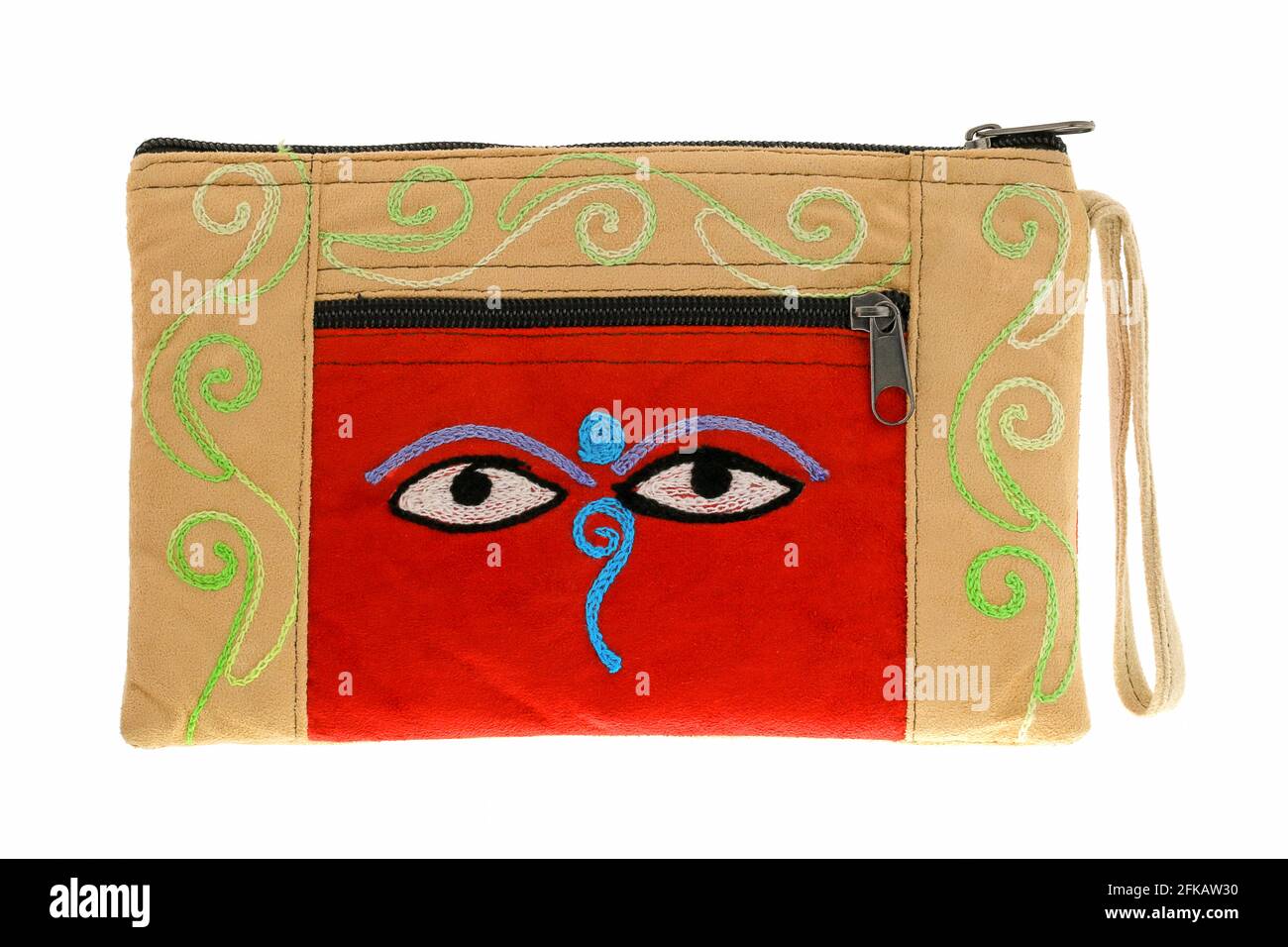 Eine kleine beige Tasche mit Symbol Nepali Buddha Eyes, gemeinsames Souvenir aus Nepal Stockfoto