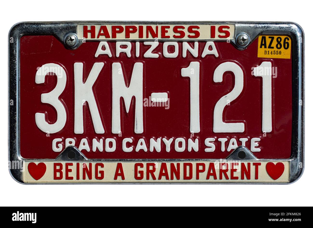 Altes braunes Standard-Nummernschild aus Arizona - „Grand Canyon State“ und verchromter Plattenrahmen mit dem Slogan „Happiness is being a Grand parent“, 1980er Jahre Stockfoto