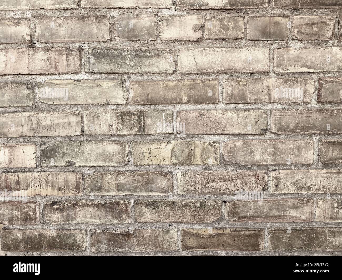 Verzweifelte alte alte Ziegelsteinmauer mit Dreck und Dreck Festung Burg Gebäude Struktur Stockfoto