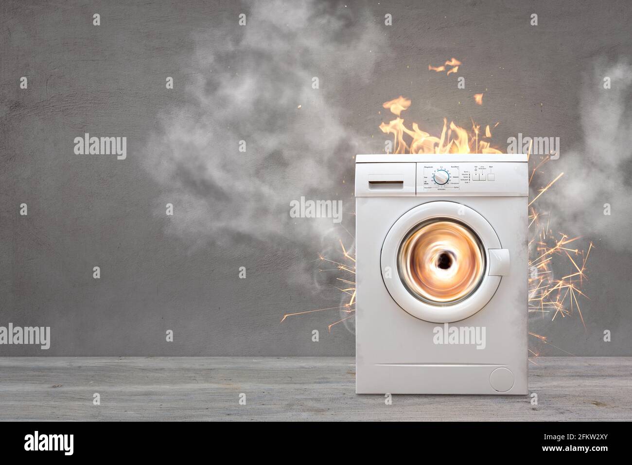 Kaputte Waschmaschine Mit Rauch Und Feuer Stockfoto