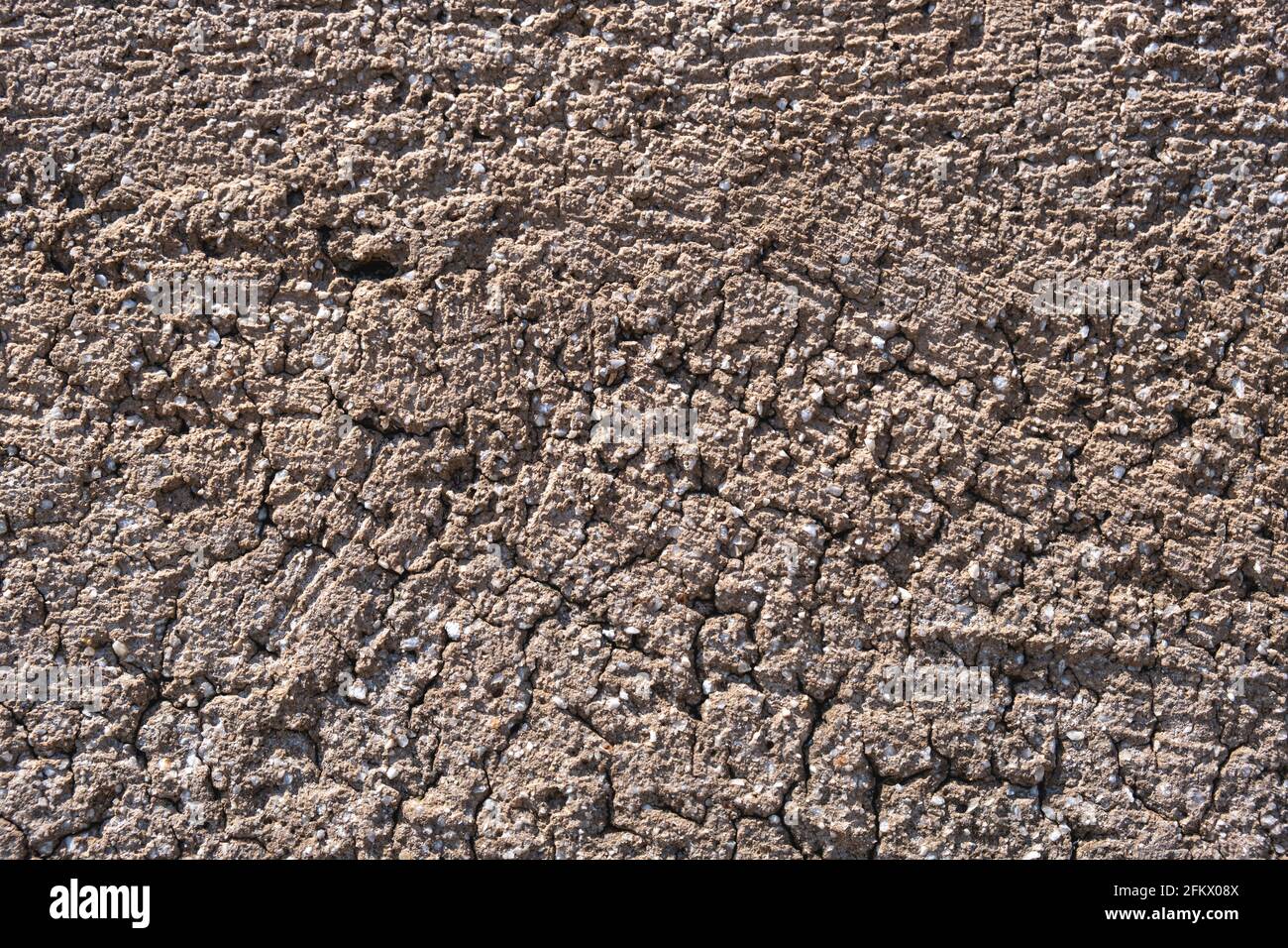 Beige leere alte raue Wand für Hintergrund, Textur. Äußere Struktur aus Stein, körnigen Beton, porös, körnigen Mineral im Alter beschädigt vintage blank su Stockfoto