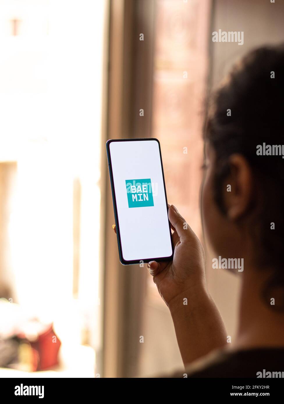 Assam, indien - 04. Mai 2021 : BAEMIN-Logo auf dem Telefonbildschirm. Stockfoto