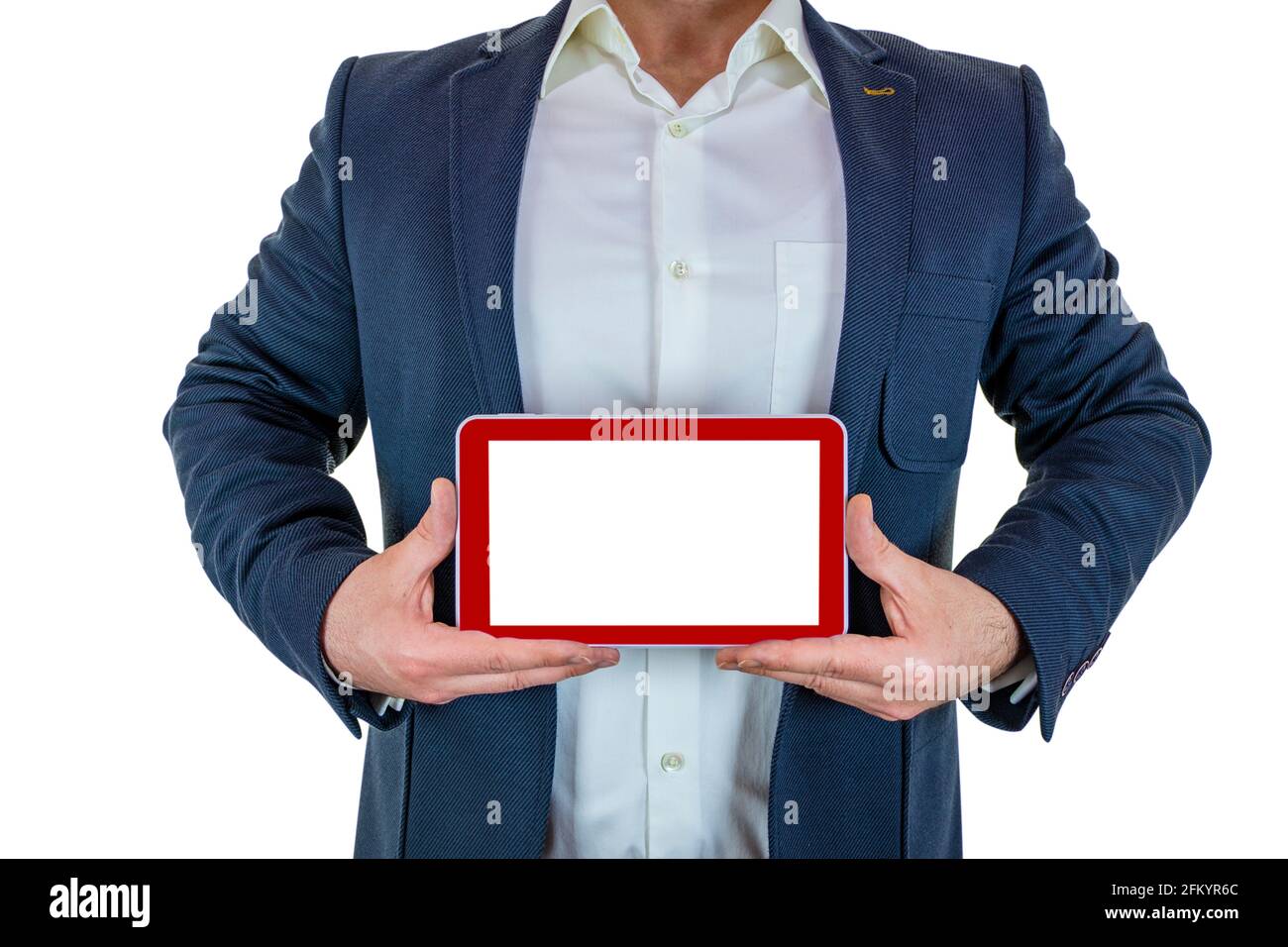 Der Mann im Anzug hält die rote Tablette mit beiden Händen Stockfoto