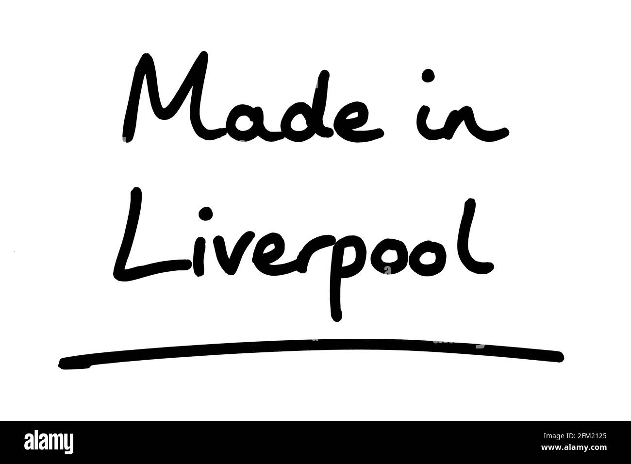 Hergestellt in Liverpool, handgeschrieben auf weißem Hintergrund. Stockfoto