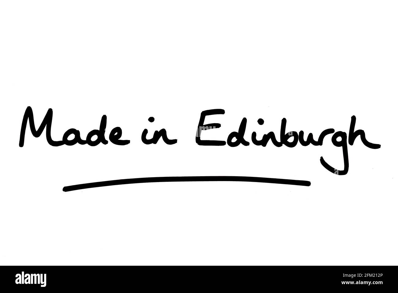 Hergestellt in Edinburgh, handgeschrieben auf weißem Hintergrund. Stockfoto