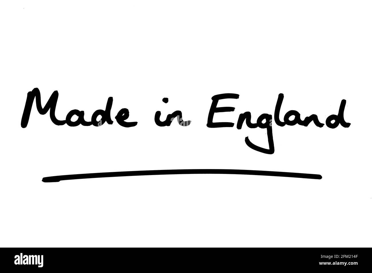 Hergestellt in England, handgeschrieben auf weißem Hintergrund. Stockfoto