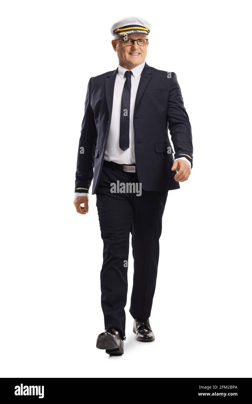 Ganzkörperportrait eines Piloten in einer Uniform zu Fuß In Richtung der Kamera, isoliert auf weißem Hintergrund Stockfoto