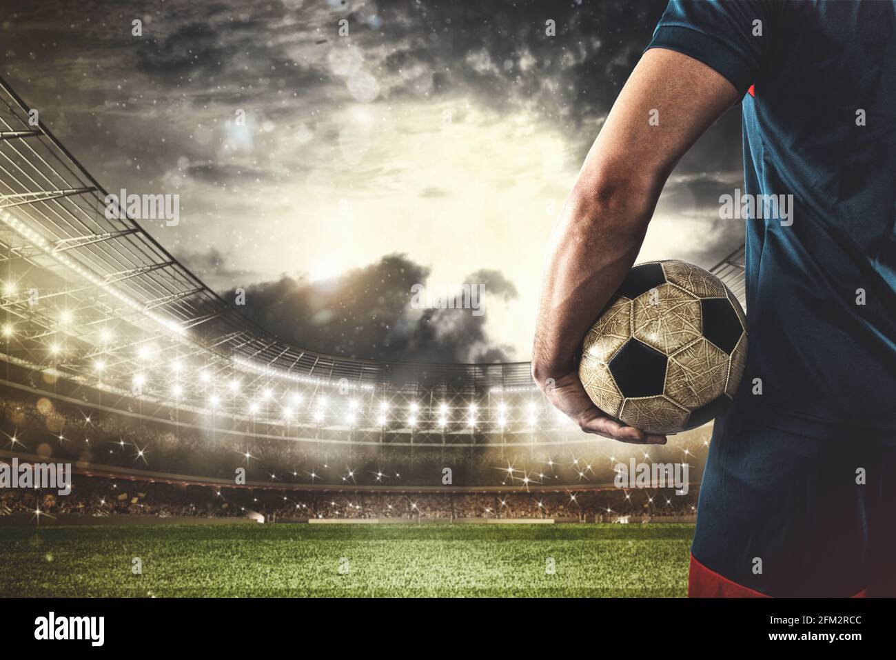 Fußballspieler bereit zu spielen oder den Ball in Seine Hände im Stadion Stockfoto