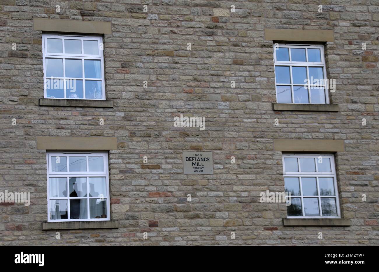 Wasserbetriebene Defiance Mill, die von Samuel Henshaw 1800 gebaut wurde Für die Baumwollspinnerei in Bollington und 2000 umgebaut als Eine Wohnanlage Stockfoto