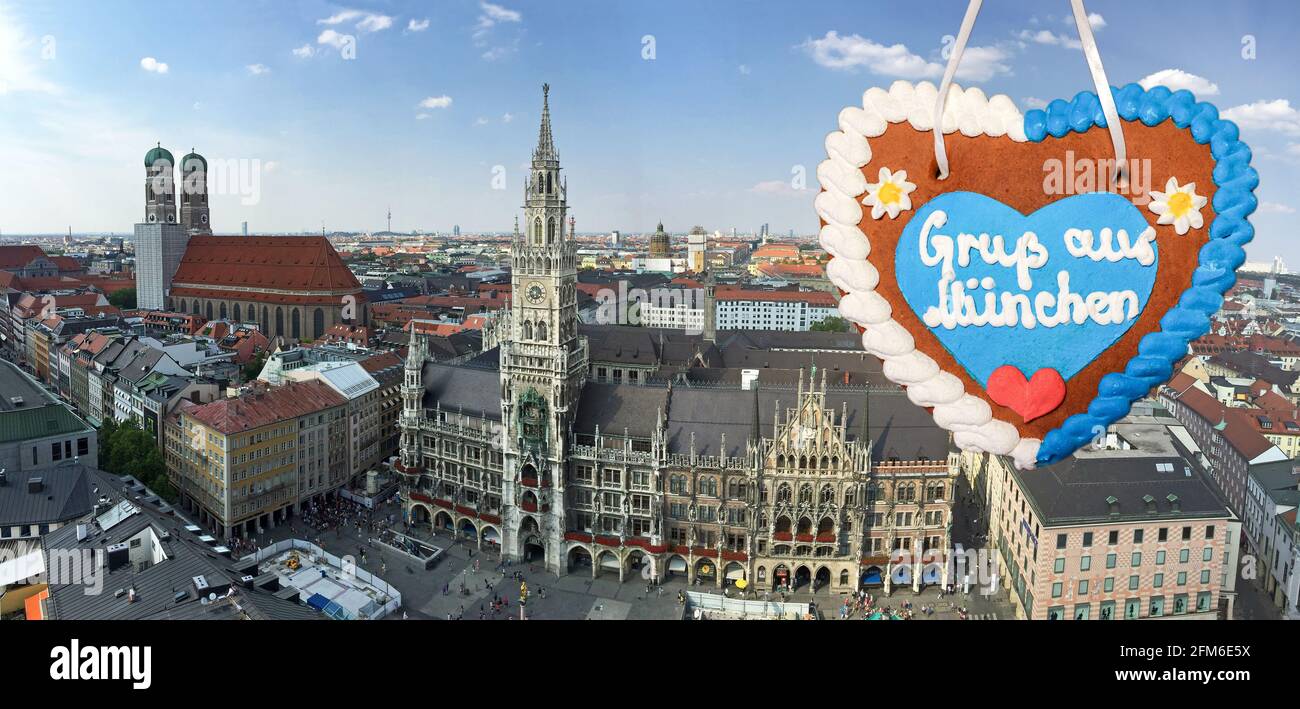 Skyline mit Altstadt von München mit Marienplatz und Rathaus, Lebkuchenherz mit schriftlichem Slogan 'Grüße aus München', bayerische sy Stockfoto