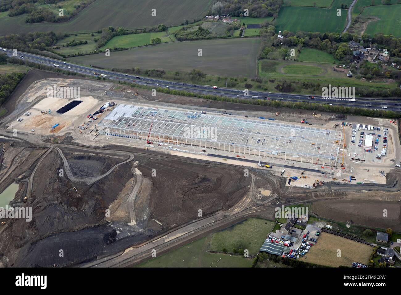 Luftaufnahme einer neuen industriellen Entwicklung (möglicherweise des Hermes 'Mega Hub') in der Nähe der Green Lane Farm, Tankersley, Barmsley, Großbritannien Stockfoto