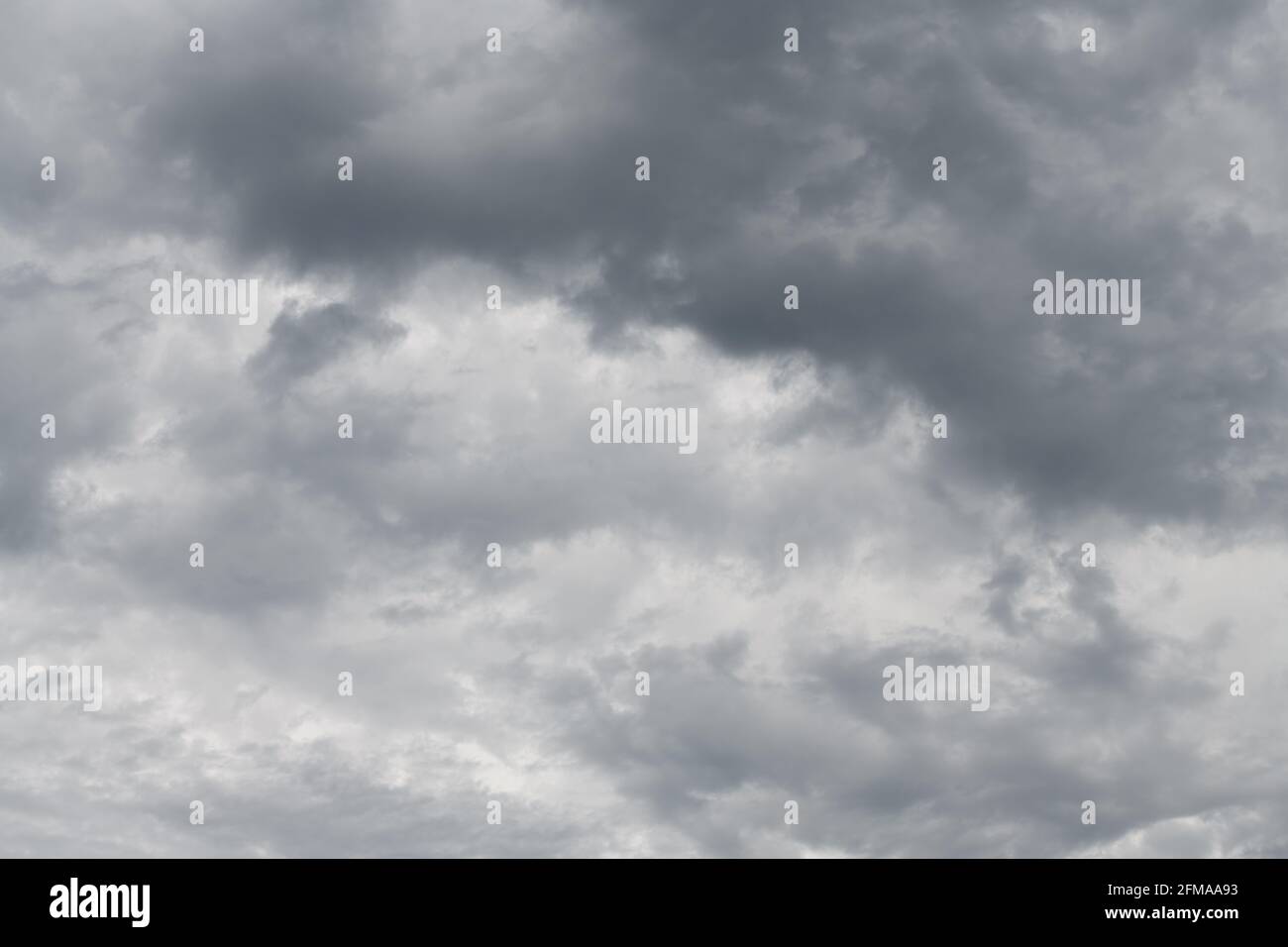 Ein durchgehendes Muster aus Wolken, die sich als komplexer Hintergrund entwickeln Muster Stockfoto