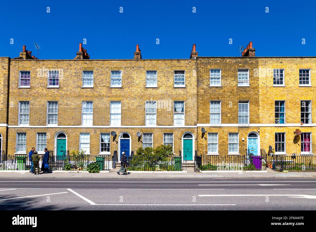 Georgianische Terrasse, Terrassen Häuser entlang der Commercial Road, East London, Großbritannien Stockfoto